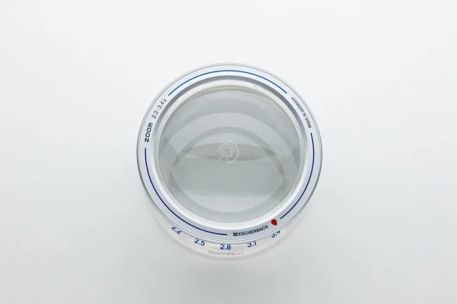 Лупа светопольная Eschenbach menas ZOOM, 65 мм, 2.2х-3.4х Лупа светопольная Eschenbach menas ZOOM, 65 мм, 2.2х-3.4х